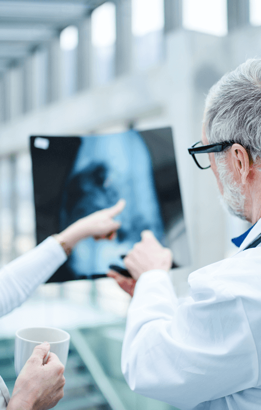 doctors-looking-at-x-ray-on-medical-conference-di-2024-10-18-11-01-29-utc